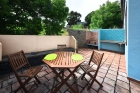 Terrasse mit großzügiger Außenküche (Barbacoa)