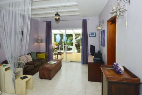 Apartment 1, Wohnküche, Wohnbereich, Zugang zum Wintergarten und Terrasse