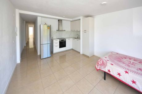 Wohnküche mit Balkon